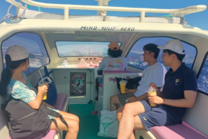 Midday Island Escape: Japanese Friends Enjoy a Private Speedboat Adventure from Teluk Nare to Gili Trawangan with Just Their Bags and Big Smiles